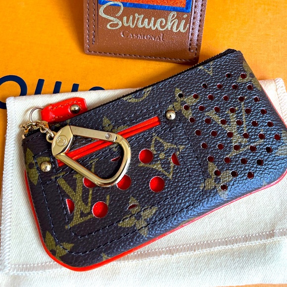 Louis Vuitton Handbags - Limited Edition Authentic Louis Vuitton Perforated Key Close